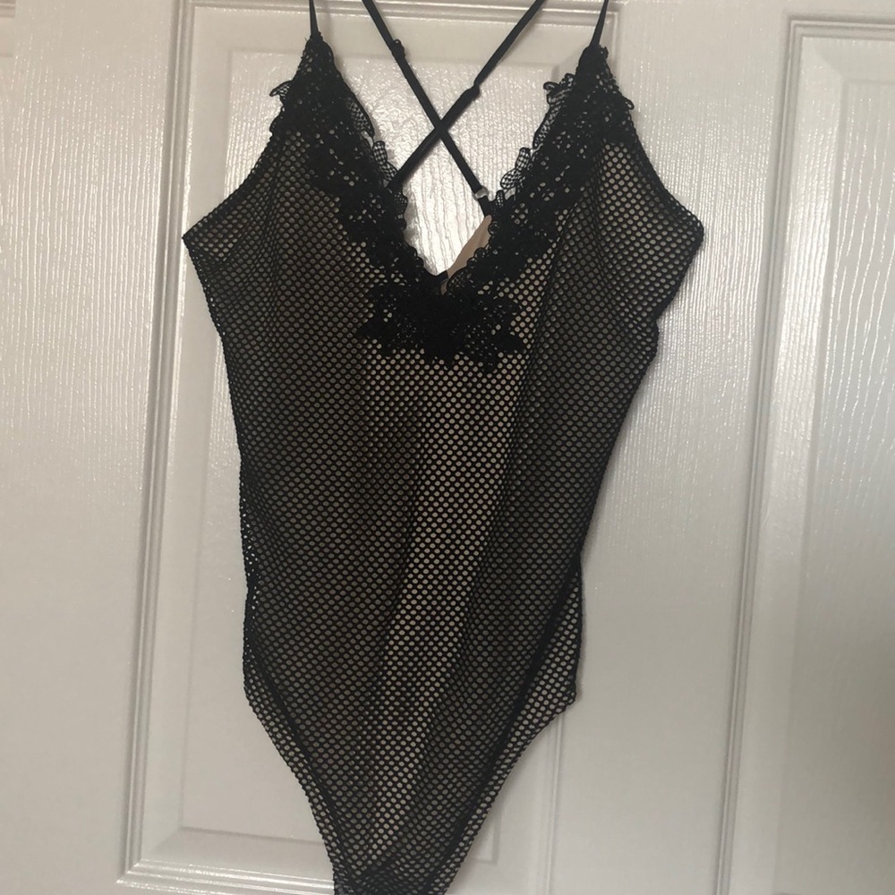 Nude and black bodysuit
